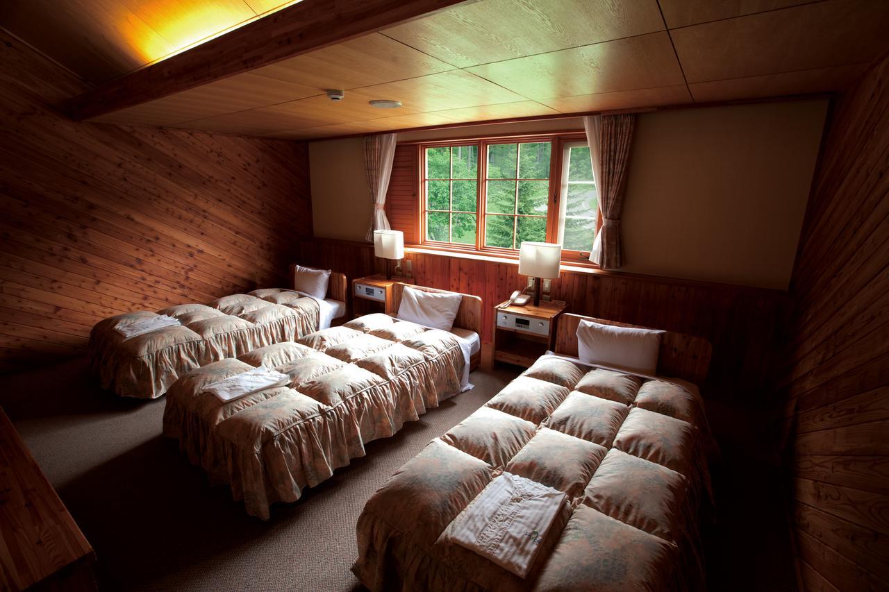 Log Hotel Larch Lake Kanayama Minamifurano Cameră foto